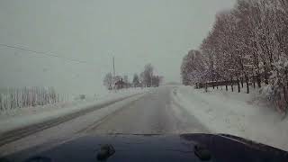Driving Through a Snowfall in the Appalachian Mountains