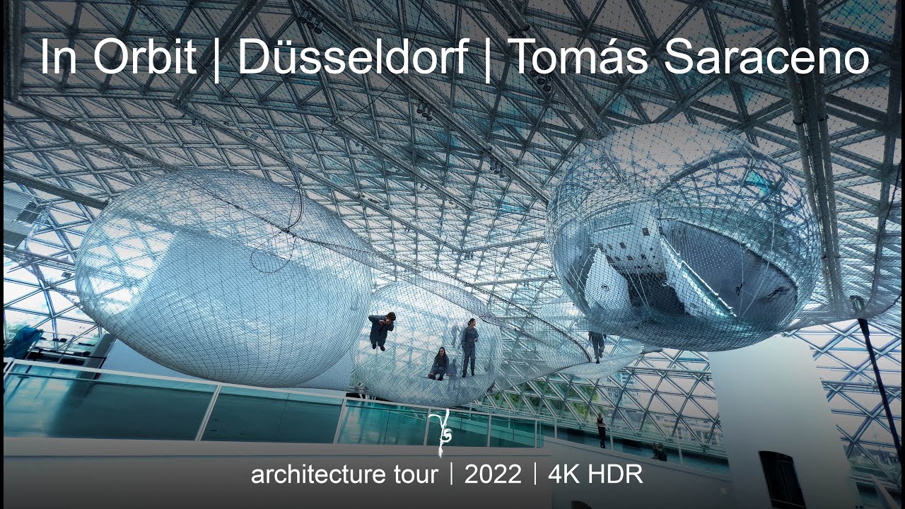 Experience modern architecture on a vibrant walking tour in Düsseldorf, featuring Orbit K21 by Tomás Saraceno in stunning 4K HDR.