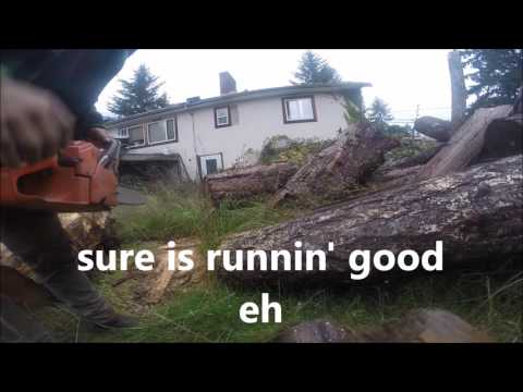 VINTAGE HUSQVARNA 266 CUTTING LOGS