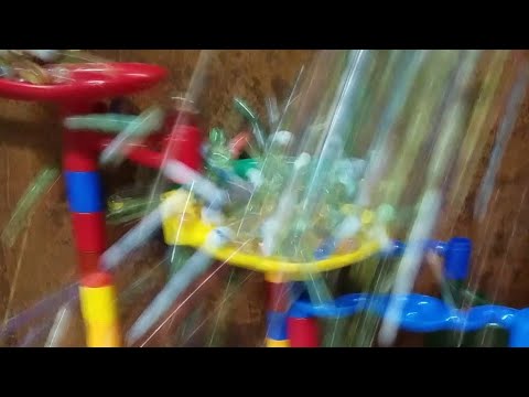 1000 MARBLES DESTROYING A MARBLE RUN!?