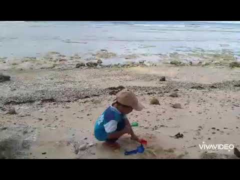 Naeem playing at Bangunay beach