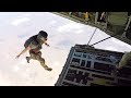 U S Air Force Pararescuemen Execute Cargo Drop And Tandem Jump From C 130J Super Hercules
