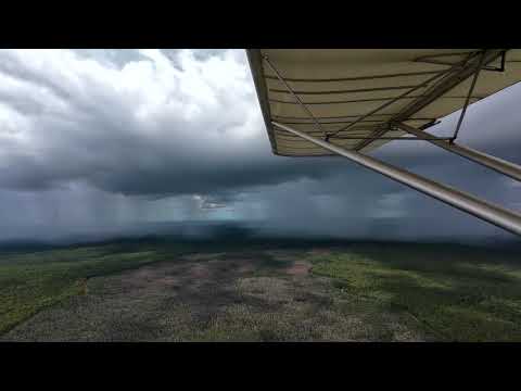 Flying and watching beautiful clouds drift by in the wet season - NT, Australia