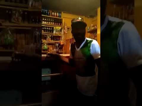 Jamaican at the rum bar