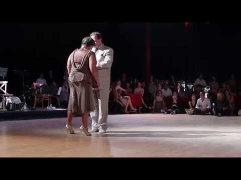  María del Carmen Romero  and  Jorge Dispari  are  dancing  to  a  tango  in  2014