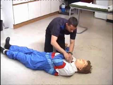 CPR Manikin cleaning - "danny" CPR dummy mannequin-man performming as a CPR Dummy: Care and Maintenance of "danny" CPR Manikin dummy. How to clean the mannequin's face after each CPR use by using sterile alcohol based wipes for West Mids Fire Service on 28/03/2003