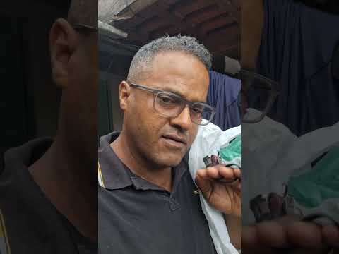 A flooded road on MG-202 is temporarily closed in Urucuia, Minas Gerais.