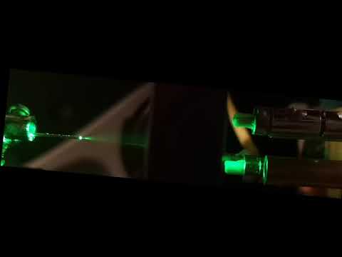 Injection of charged particles into a linear Paul Trap