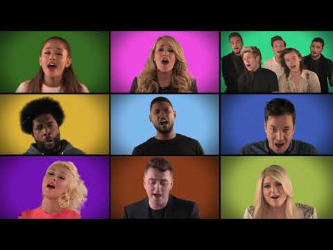 Jimmy Fallon, The Roots, and Music Superstars Sing "We Are The Champions A Cappella" Usher In Middle