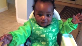 Baby in Green Owl MAM Bibetta Bib