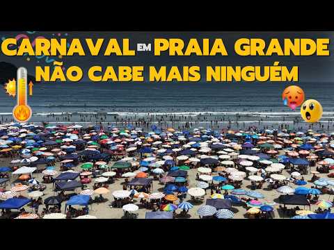 Carnival in Praia Grande, with a packed beach and very hot weather - Walking Tour