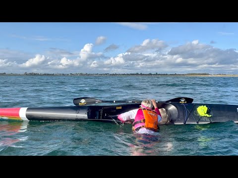 Surfski reentry in waves