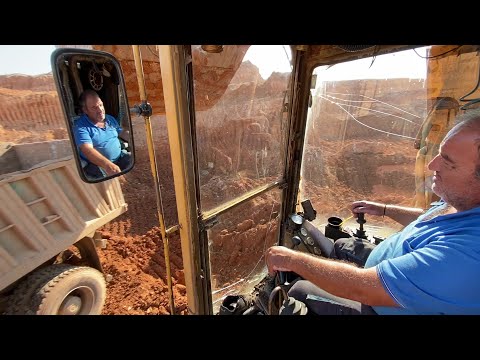 Old Caterpillar 245 Excavator Loading Mercedes And MAN Trucks - Operator View