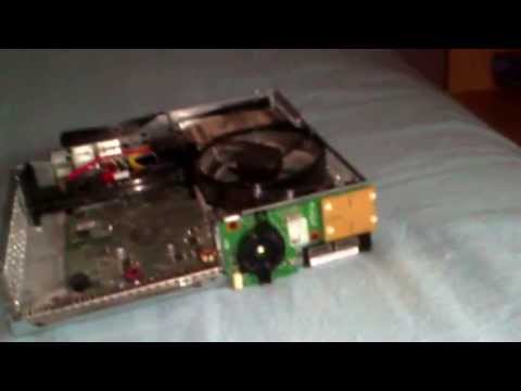 comment demonter une xbox 360 slim
