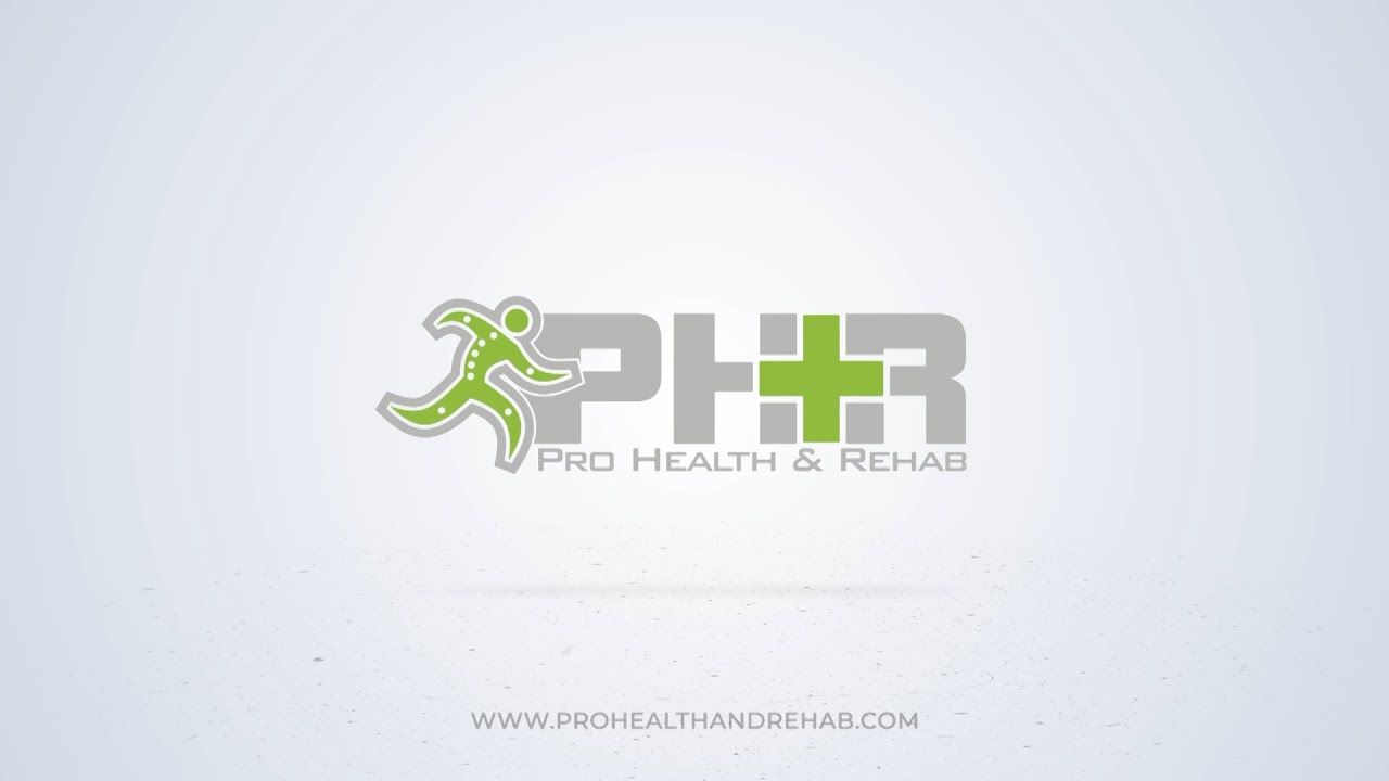 Dr. Charlie Saboura explaining chiropractic care and nerve pain relief in Marietta, GA