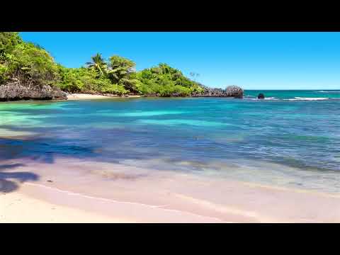 Splashing Waves All Day on Playa Encuentro - Refreshing and Relaxing on a Hot Summer Beach