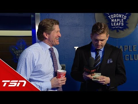 Mike Babcock gives Mark Masters funding for some shoe polish