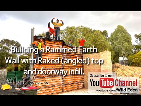 Rammed Earth Ramming a sloping (raked) roof wall with doorway (infill) . Timelapse with commentary