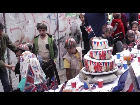 Banksy holds Balfour 'apology party' for Palestinians