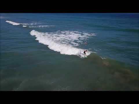Drone footage of surfers at Pelican Beach Park