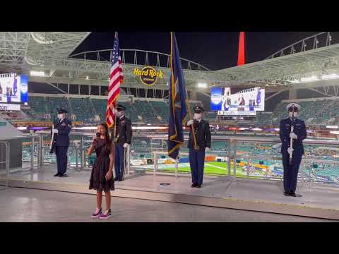 Reina Ozbay sings The Star Spangled Banner at the 2021 Capital One Orange Bowl