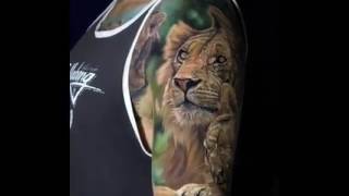 Realistic lion half sleeve made by Steve Butcher