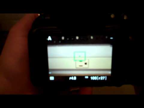 How to use the timer feature in the Nikon DSLR camera