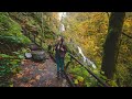 Hiking Through Forest To A Beautiful Waterfall