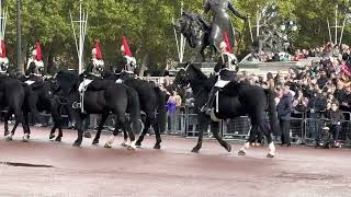 Kings Guards Riding Past Buckingham Palace On Beautiful Horses