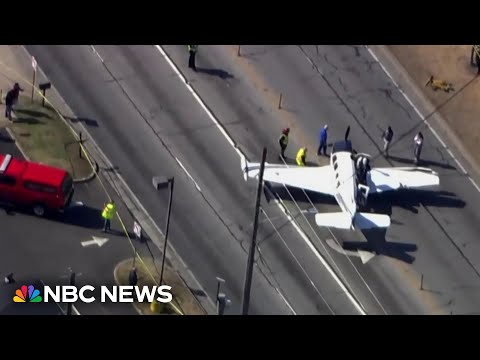 Small plane crash lands on busy Georgia street