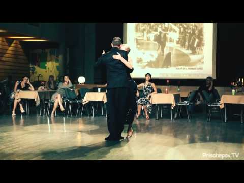  Michael Nadtochi  and  Eleonora Kalganova  are  dancing  to  the  milonga  "  Me Gusta  "