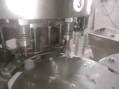 Rotary Semi Liquid Filling, Plugging and Capping Machines