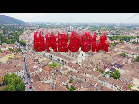 Inscription on video. Brescia, Italy. Sant Afra, Brescia. Arnaldo Square. Flames with dark fire, Aer
