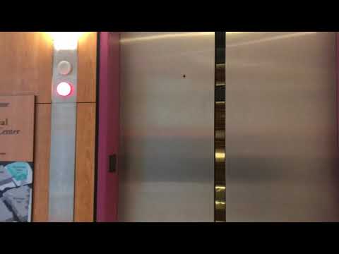 2001 Otis Geared Elevonic (411) traction parking elevators @ Texas Children’s Mark A. Wallace Tower