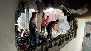 Gazze'de sakinler geceki İsrail hava saldırısının yol açtığı yıkımı inceledi