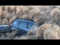 Huge tumbleweeds bury cars and close motorway