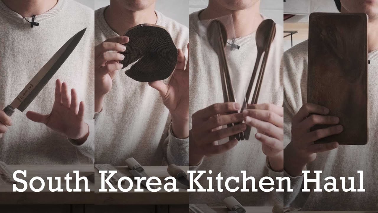 A Korean kitchen counter displaying essential Korean cooking tools including ddukbaegi clay pots dolsot stone bowls and metal cookware ready for cooking