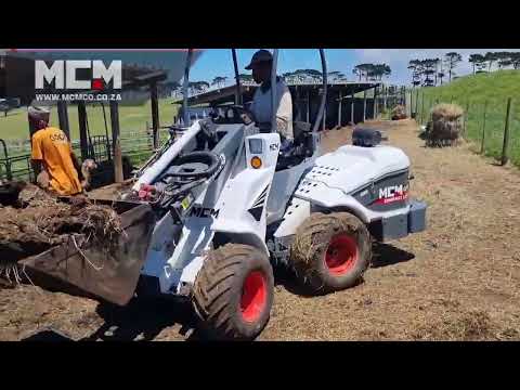 CL40 Compact Loader Loading Manure on Sheep Farm