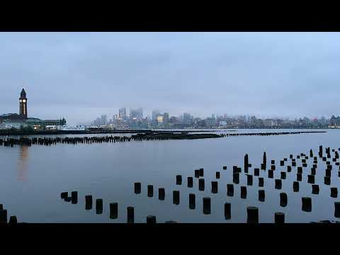 🌆 Time-Lapse Dawn: Clouds Over Manhattan Old Pier