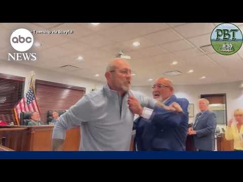 New Jersey mayor defends charging critic during town hall meeting