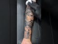 Removing the protective second skin from the tattoo and moisturising.