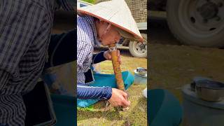 Vietnamese man smoking traditional bamboo bang (Thouc Lao) in japan 🇯🇵