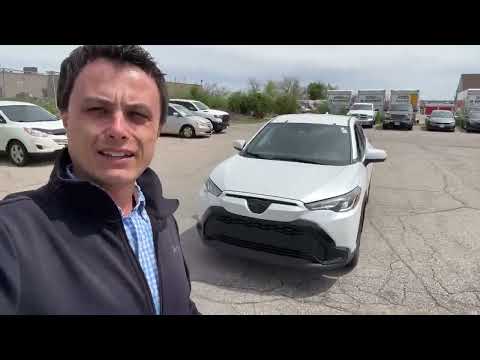 2023 Toyota Corolla Cross Hybrid SE AWD in White for sale at Kitchener Chrysler Dodge Jeep Ram in Kitchener, ON