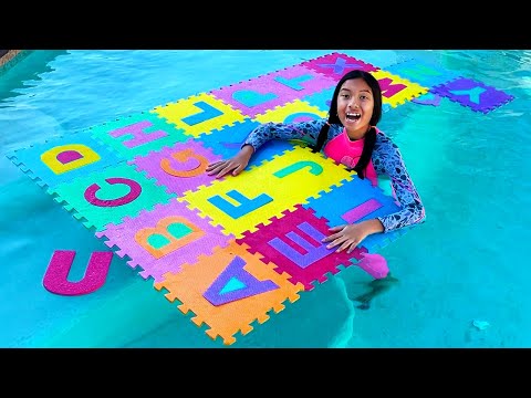 Wendy and Eric Learning ABCs with Summer Alphabet in Swimming Pool