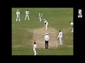 Dennis Lille Bowls A Ball From Behind The Umpire