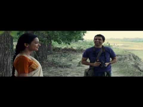 Poetry Assamese by Bhupen Hazarika - AS THE RIVER FLOWS (Assamese)