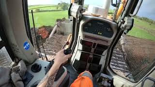 Liebherr 734 stripping top soil...