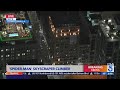 Spider-Man climbs downtown building