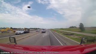 Brick through windshield