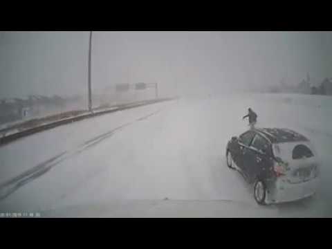 DashCam: Semi Truck crashing with two cops car during snowstorm